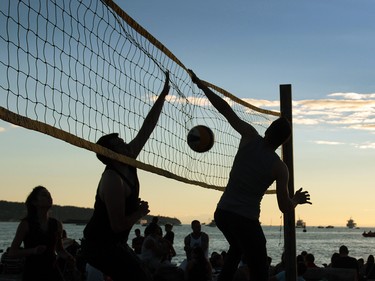 Pick-up beach volleyball games occurred while waiting for the start of The Celebration of Light.  Rob Kruyt Photo