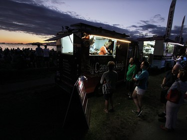 Food trucks did a brisk business as crowds waited for the start of the first night of The Celebration of Light.  Rob Kruyt Photo