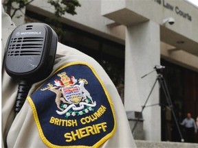 In 2011, sheriffs protested a reduction in hours and services outside New Westminster Courthouse.