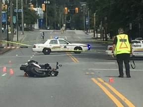 A woman was taken to hospital after her motorcycle collided with a car in Coquitlam on Sunday afternoon, July 10, 2016. Mike Bell/PNG [PNG Merlin Archive]