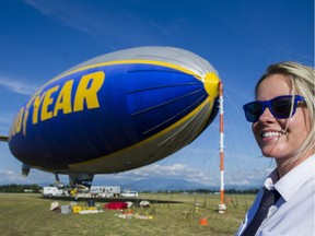 Pilot Taylor Laverty stands in front of the Goodyear Blimp, the Spirit of Innovation, at the Abbotsford airport on Wednesday. Gerry Kahrmann/PNG