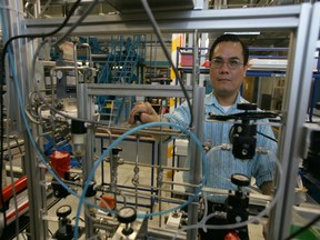 An engineer with Ballard Power works in the company's Burnaby manufacturing and testing facility.