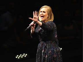 Just five things, that's all you get! Adele on stage in St Paul, Minn.