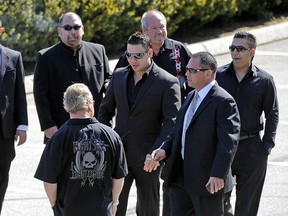 Glenn Sheck, fourth from the right, wearing sunglasses, attends a Surrey memorial service in 2012 for Tom Gisby, who was shot dead in Mexico. Sheck wants to be released on bail pending his full extradition hearing scheduled for January 2017.