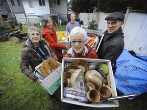 Clockwise, from left, Sharon Yandle, Val Embree, Peer-Daniel Krause, Wes Knapp and Kathleen MacKinnon from the False Creek South Neighbourhood Association’s refugee committee are still awaiting the arrival of the Syrian family they sponsored, who are stuck in a refugee camp in Iraq.