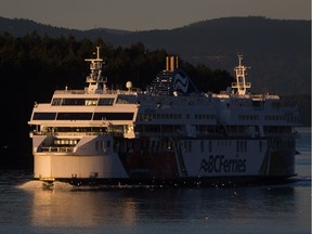 The B.C. Ferries vessel Coastal Celebration travels between Mayne Island and Galiano Island during a sailing from Swartz Bay on Vancouver Island to Tsawwassen.