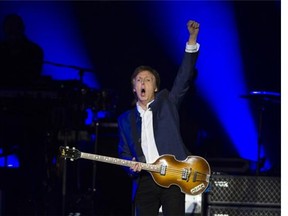 Paul McCartney salutes the crowd during the first of two concerts at Rogers Arena on Tuesday night.