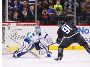 File: Ryan Miller #30 of the Vancouver Canucks makes the save on John Tavares #91 of the New York Islanders in the final shootout round to defeat the Islanders 2-1 at the Barclays Center on January 17, 2016 in the Brooklyn borough of New York City.