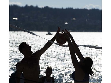 Volleyball players play on the beach at English Bay prior to Team Australia competing in the  Honda Celebration of Light fireworks display, Vancouver, July 27 2016.