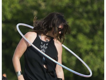 Christina Norberg spins hoops at the main stage at the 39th annual Folk Music festival Jericho Beach Vancouver, July 15 2016.