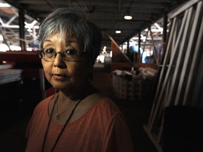 Judy Hanazawa, whose parents were among some 22,000 Japanese-Canadian detainees, stands outside the PNE's livestock buildings, where internees were held for several months at a time.