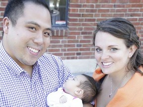 Richmond residents Richard and Kelly Belleza with their daughter who was born at Lion's Gate Hospital after the couple were told to go there because Richmond was full. The couple is expecting again in September and hoping they don't go through the same experience.