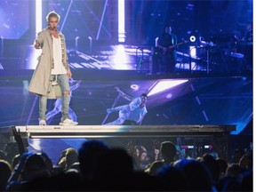 Justin Bieber performs on stage during opening night of the ‘Purpose World Tour’ at KeyArena on March 9, 2016 in Seattle, Washington.
