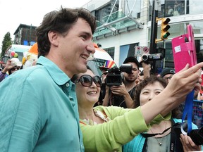 Prime Minister Justin Trudeau poses for a photo at the 2016 Pride Parade in Vancouver, BC., July 31, 2016.
