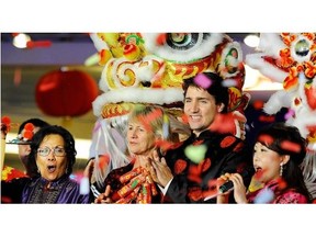 Justin Trudeau, now prime minister, celebrates Chinese New Year in Richmond’s Aberdeen Centre in 2014. When he says Canada is the world’s “first postnational state,” he probably means this is a place where respect for minorities trumps any one group’s way of doing things.
