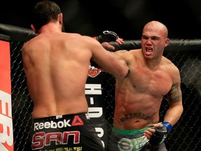 Robbie Lawler punches Johny Hendricks in their welterweight title fight during the UFC 181 event at the Mandalay Bay Events Center on December 6, 2014 in Las Vegas, Nevada.