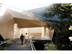 The main entrance to the Audain Art Museum is over a bridge to an entry porch ribbed with strips of Hemlock. The illuminated wood is intended to give the building a ‘warm glowing character,’ said architect John Patkau.