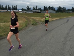 Tessa Ladner and Michael Taylor, the winners of Sunday's 5K races, were engaged in their own speed battle for most of Sunday's MEC Abbotsford Runway event.