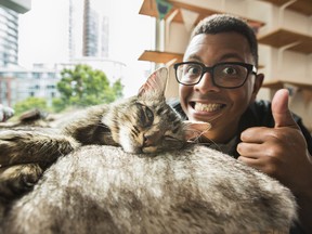 Harrison Mooney pens new lyrics to Adele’s Hello after the British superstar met Larry the cat at the Catfe in Vancouver.