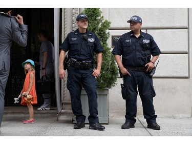 New York City Police Department counterterrorism officers stand guard outside the French Consulate, July 15, 2016 in New York City. Following the terrorist attack in Nice, France, New York governor Andrew Cuomo has directed law enforcement to step up their security presence at high profiles locations around New York City.