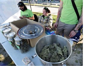 People attend the annual 4:20 marijuana event at it's new location, Sunset Beach, Vancouver April 20 2016.