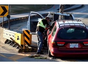 A northbound red/maroon Mercury Sable station wagon drove across the Pattullo Bridge straddling the center line and over the pilon dividers until she crashed into a concrete divider on the New Westminster side. The incident took place August 6, 2015 on Pattullo Bridge at or around 6:15 PM
