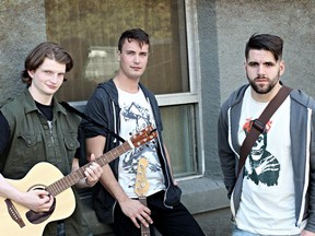 Nick Heffelfinger, Ross Foster (centre) and Tristan Smith (right) star in American Idiot, which runs from through Aug. 27 at the Waterfront Theatre.