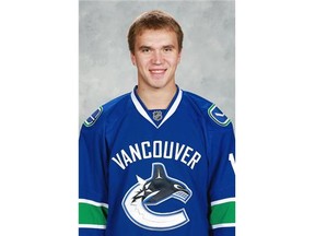 Nikita Tryamkin of the Vancouver Canucks poses for his official headshot for the 2014-2015 season on Sept. 18, 2014 at Rogers Arena in Vancouver.