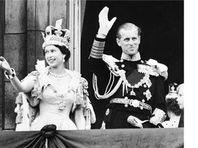 (FILES) In a file picture taken on June 2, 1953 Britain's Queen Elizabeth II accompanied by Prince Philip waves to the crowd after being crowned during her coronation at Westminter Abbey in London. Britain's Queen Elizabeth II will start five months of diamond jubilee celebrations this weekend marking 60 years to the day on February 6, 2012 since she ascended to the throne after the death of her father.  AFP PHOTO / STF (Photo credit should read STF/AFP/Getty Images)
