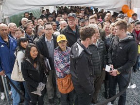 People line up to buy into a condo project in Surrey.