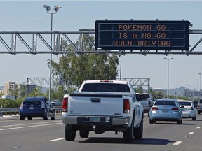 A freeway sign IN Phoenix urges drivers o not play Pokemon Go behind the wheel. Police in Vancouver and Richmond have posted similar warnings ahead of the game's official release in Canada.