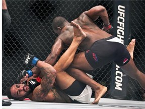 Light Heavyweight Rafael Cavalcante takes another hard punch to the face from Ovince Saint Preux during their UFC Fight Night 82 match.