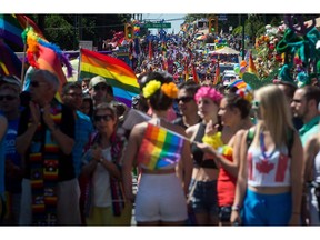 People pack downtown streets during the Vancouver Pride Parade in Vancouver in 2014.