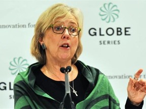 A senior part official has quit after the party refused to allow an open debate over the leadership of Green party leader Elizabeth May.