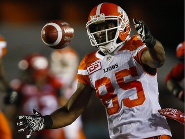 BC Lions' Shawn Gore tries to scoop up the ball during second half CFL football action against the Calgary Stampeders in Calgary, Friday, July 29, 2016.