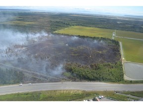 Crews working for the fire department in Delta, are withdrawing from an ecologically sensitive bog more than a week after it caught fire.