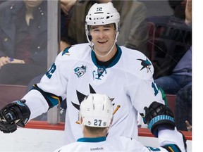 San Jose Sharks' Patrick Marleau celebrates his goal against the Canucks during the third period of their game in Vancouver on Thursday night.