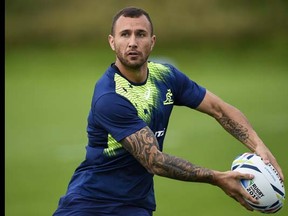 Australia's flyhalf Quade Cooper attends a training session, on September 15, 2015 at the University of Bath, three days before the opening match of the Rugby World Cup 2015 between England and Fidji at Twickenham stadium.