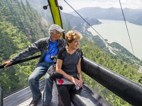 Tourists Dennis Passis (left) and Merle Passis from Chicago ride the gondola at the Sea to Sky Gondola in Squamish.