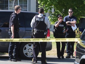 IHIT on there scene of a fatal shooting at 14302 90A Ave, in Surrey, BC., July 24, 2016. At approximately 10:19 pm on July 23, 2016, Surrey RCMP responded to a report of shots fired in the 14300 block of 90A Avenue.