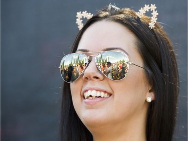 Dancers are reflected a set of sunglasses as Ekau performs at FVDED in the PARK at Holland park in Surrey on July 2, 2016.