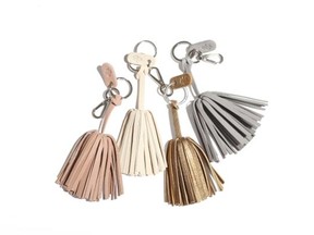 Tassel treat   Can’t afford — or simply don’t want — a new bag this spring? Update your handbag with a simple add-on like these leather tassels from Canadian brand ela. Available in a bevy of shades — from blue to blush and even metallic — there’s a charming fringe for every type of purse. elabyela.com | $48