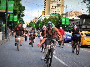 Terminal City Riders take part in their annual Lucha Libre bike ride. Participants are encouraged to wear a Mexican wrestler's mask and have fun while riding a bike.