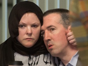 John Nuttall, left, and Amanda Korody sit at B.C. Supreme Court after a judge ruled the couple were entrapped by the RCMP in a police-manufactured crime, in Vancouver on Friday, July 29, 2016.