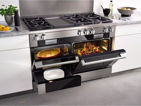 The Miele 48" Range is a "one-stop culinary centre." This one features 6 gas burners and a hot plate, along with three ovens: a speed oven, which incorporates an oven for dry cooking and a microwave, a steam oven and warming drawer that also acts as a slow roaster.