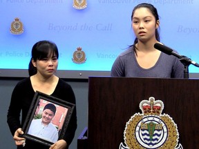 Tiffany Nguyen speaks to media beside her mother Kim at a press conference Tuesday morning to announce a reward of $10,000 to find the killer of her brother Jason. [PNG Merlin Archive]