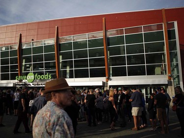 Fans gather to see Gord Downie, and the first stop of the Tragically Hip's Man Machine Poem Tour outside the Save-On-Foods Memorial Centre in Victoria, B.C., Friday, July 22, 2016.