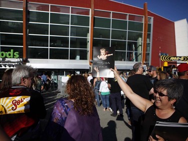Fans gather to see Gord Downie, and the first stop of the Tragically Hip's Man Machine Poem Tour outside the Save-On-Foods Memorial Centre in Victoria, B.C., Friday, July 22, 2016.