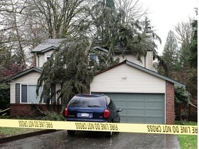 A tree blown down during Thursday’s windstorm killed a woman in this house in the Mountain Meadows neighbourhood of Port Moody.