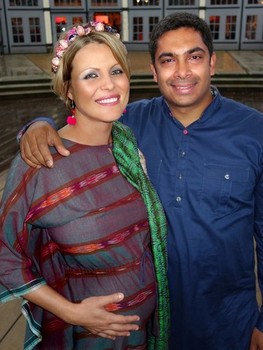 Two days before their first baby's due date, Laura Byspalko and Sirish Rao welcomed guests to their Indian Summer Festival's kick-off.